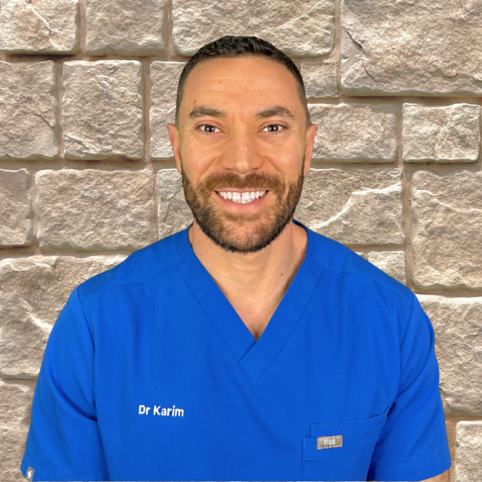 Dr. Mohamed Karim, D.C., host of The Healing Wellness Show, board certified in neuropathy and functional neurology, North Liberty Iowa